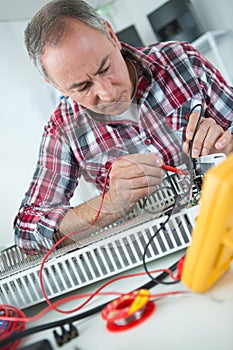 Worker checking tool with optical device