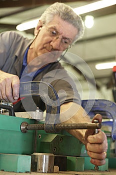 Worker and clamps photo