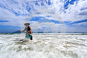 Worker Cleaning Doc Let Beach, Vietnam