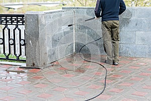 Worker cleaning street