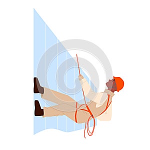 Worker climbing building wall, alpinist holding rope to climb up facade and work