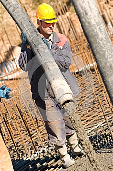 Worker on concrete works photo