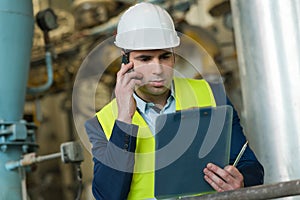 Worker construction engineer on phone