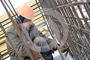 Worker at construction site making