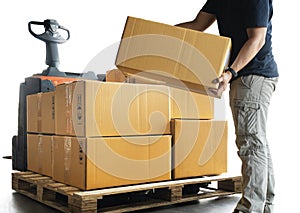 Worker Courier is Stacking Package Boxes on Pallet. Delivery Service. Shipment. Cargo Supply Chain Warehouse Logistics.