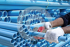 Worker cut pvc pipe