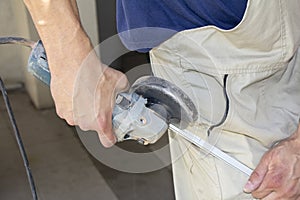 Worker cutting aluminum