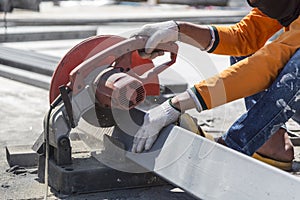 Worker cutting metal with unsafety position