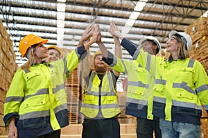 Worker doing hi five as teamwork after finish work