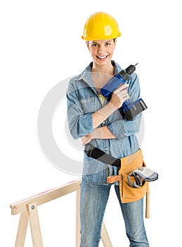 Worker With Drill And Tool Belt Standing By Work Horse