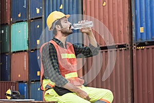 Worker is drinking water after finishing work