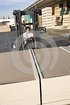 Worker Driving Forktruck