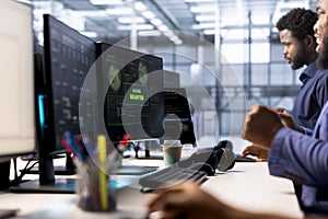 Worker ensures data center operates efficiently, eliminating all errors