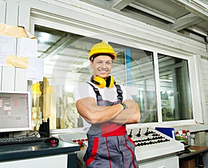 Worker in a factory control room