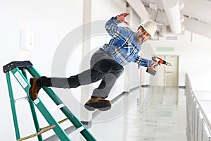 Worker Falling Off Ladder photo