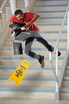 Worker Falling on Stairs