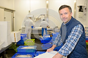 Worker during fish preparation