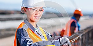 Worker fixing steel rebar at building site