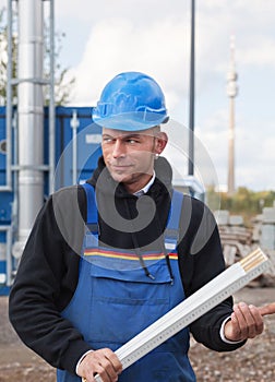 Worker with foldable ruler photo