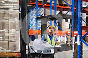 Worker on forklift, Manual workers working in warehouse, Worker driver at warehouse forklift loader works