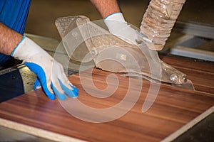 Worker on furniture factory