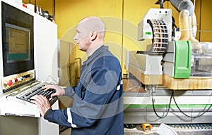 Worker at furniture manufacture workshop