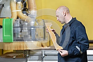 Worker at furniture manufacture workshop