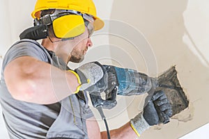 Worker with Hammer Drill