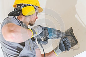 Worker with Hammer Drill photo