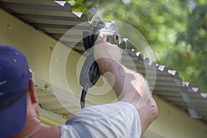 worker hand man holding broken grinder blade. Danger of using power tools. Close-up