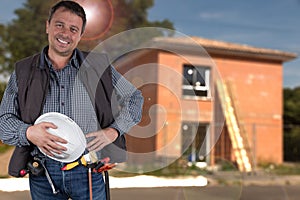 Worker handsome man with helmet security front house of brick in construction site