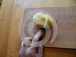 Worker hate his job as potato cutter