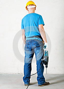 Worker hold electric drill