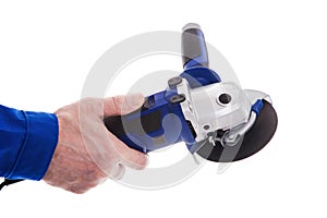 The worker holding angle grinder