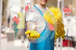 A worker is holding a cleaning service structure