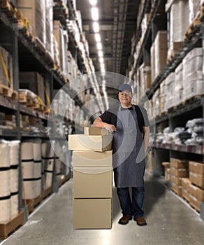 Worker holding parcel boxes