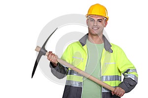 Worker holding pickaxe