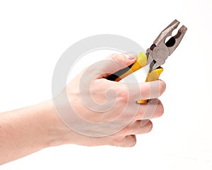 A worker holding Pliers