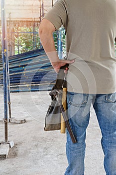 Worker holding tool bag