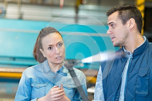 Worker holding welding torch