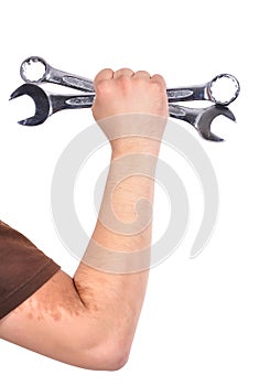 Worker holding wrench