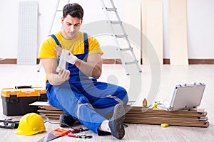 The worker with injured hand at construction site