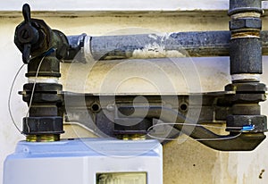 Worker insert the seals to the fitting between the pipe and gas meter