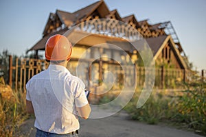 Worker, Inspector or engineer is checking and inspecting the building or house before restoration, reconstruction or demolition.