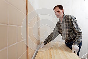 Worker installing a countertop