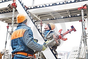 Worker installing falsework construction photo