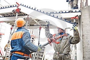 Worker installing falsework construction photo