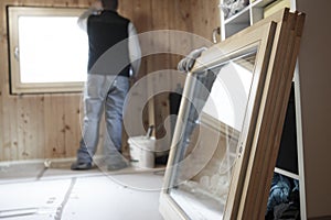 Worker installing new window