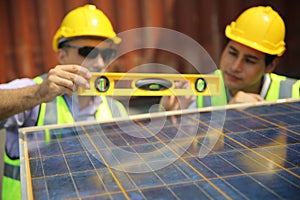 Worker is installing solar panel, technician installing solar panels on roof. Alternative energy sun energy power, ecological con