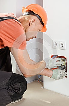 The worker is installs and connects the power supply of LED